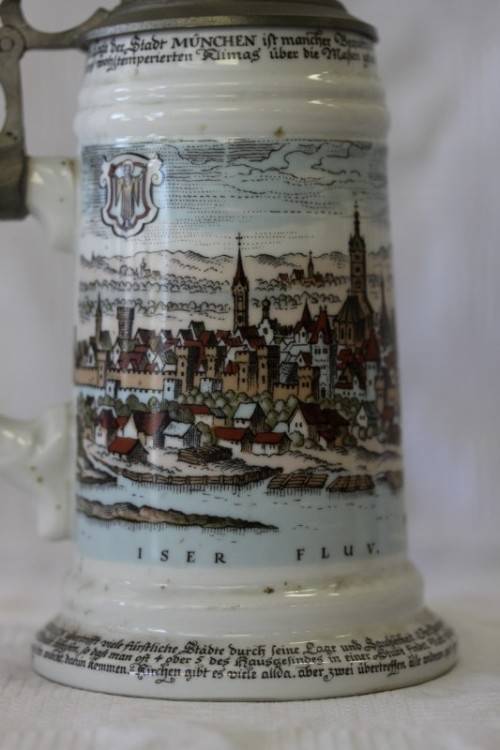 An awesome vintage white German made ceramic (lidded) Stein with "Munich" related transfer prints
