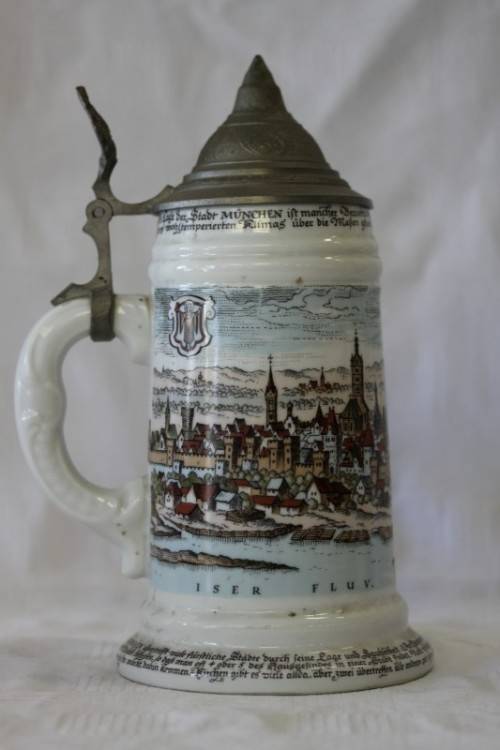 An awesome vintage white German made ceramic (lidded) Stein with "Munich" related transfer prints