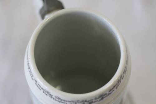 An awesome vintage white German made ceramic (lidded) Stein with "Munich" related transfer prints