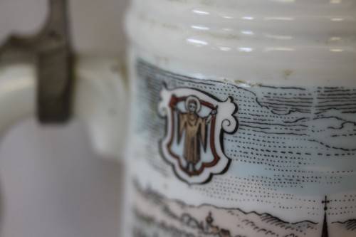 An awesome vintage white German made ceramic (lidded) Stein with "Munich" related transfer prints