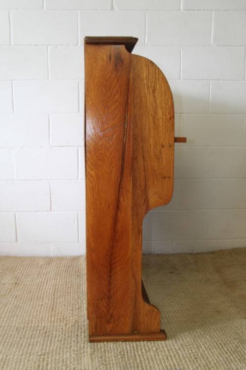 An incredible vintage solid oak roll top writing bureau with pull out writing top - very compact!