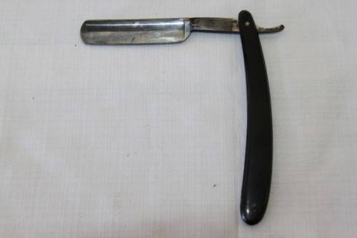 A superb set of antique "The Alexander Clark Co Ltd" cut throat razors in their original box