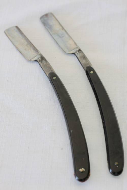 A superb set of antique "The Alexander Clark Co Ltd" cut throat razors in their original box