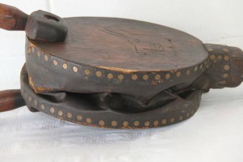 **RS17** An antique fireplace bellows with a iron tip, carved detailing and brass embellishments