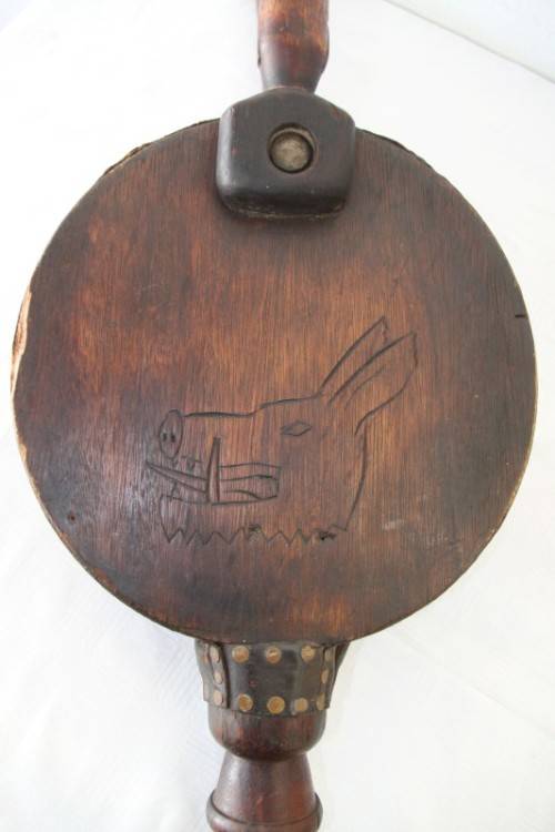 **RS17** An antique fireplace bellows with a iron tip, carved detailing and brass embellishments