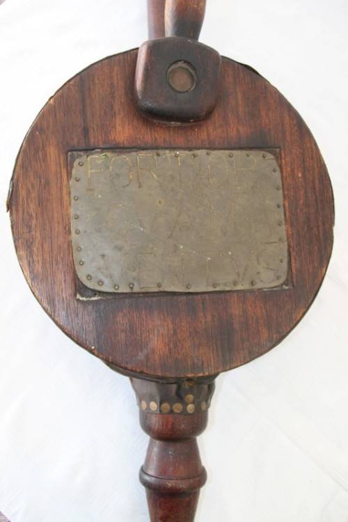 **RS17** An antique fireplace bellows with a iron tip, carved detailing and brass embellishments