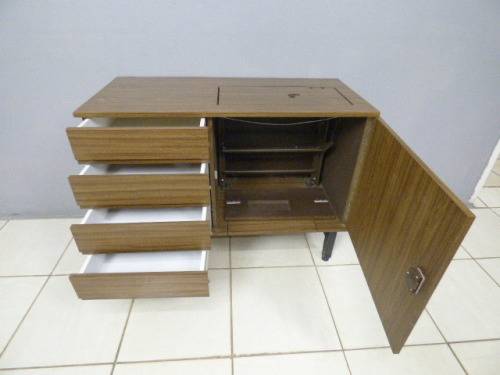 A lovely sewing cabinet with four drawers and a large cupboard. Perfect in a sewing/hobby room! RS17