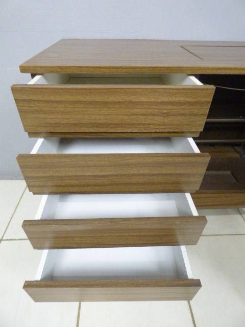 A lovely sewing cabinet with four drawers and a large cupboard. Perfect in a sewing/hobby room! RS17