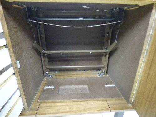 A lovely sewing cabinet with four drawers and a large cupboard. Perfect in a sewing/hobby room! RS17