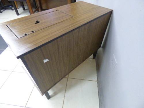 A lovely sewing cabinet with four drawers and a large cupboard. Perfect in a sewing/hobby room! RS17