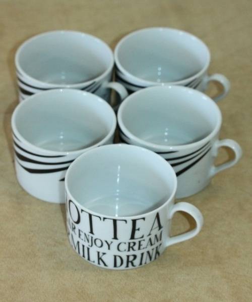 An awesome collection of five "black and white" porcelain tea/ coffee cups in excellent condition