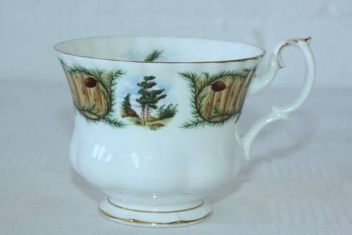 An incredibly rare vintage "Royal Albert" Knotty Pine trio, including teacup, saucer & cake plate