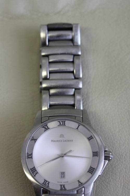 A superb Swiss made Maurice Lacroix stainless steel gents watch in its original box w/ paperwork
