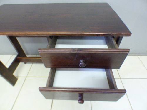 A lovely wooden writing/work desk with two spacious drawers in good condition. Perfect to paint.