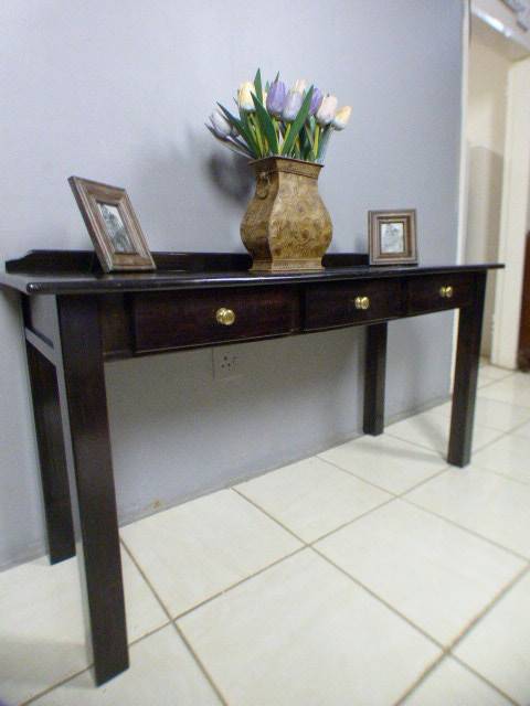 Spectacular wood buffet console/hall table with three spacious drawers in remarkable condition