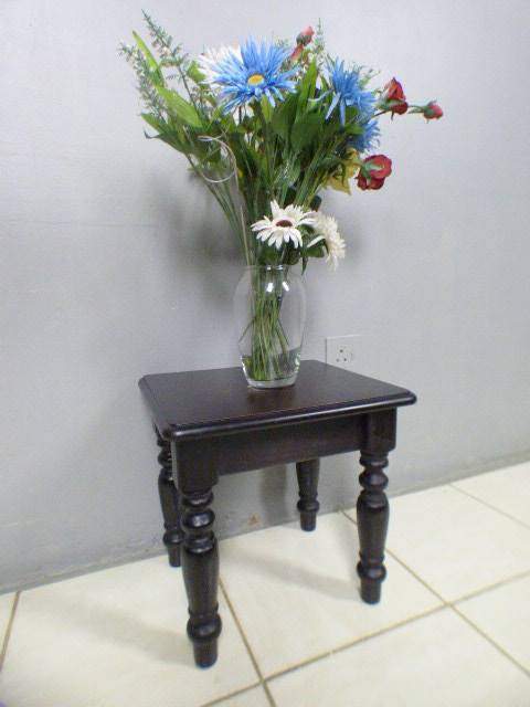 A gorgeous, heavy dark wood occasional/ display/ side table, perfect in your living rooms!!