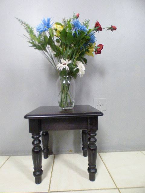 A gorgeous, heavy dark wood occasional/ display/ side table, perfect in your living rooms!!