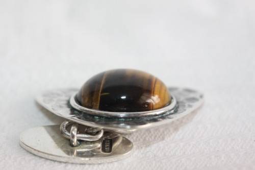 An awesome pair of silver gents chain link cuff-links with round tigers-eye stones