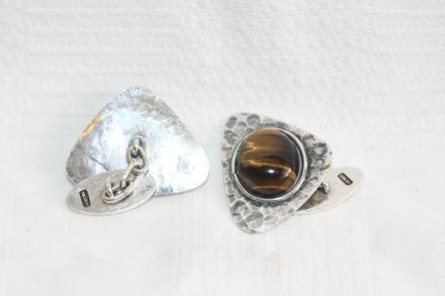 An awesome pair of silver gents chain link cuff-links with round tigers-eye stones