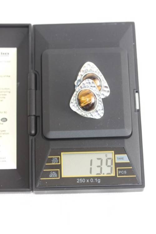An awesome pair of silver gents chain link cuff-links with round tigers-eye stones