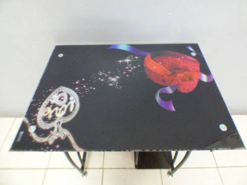 A lovely glass top writing/computer desk in good condition. Lovely in a ladies room.