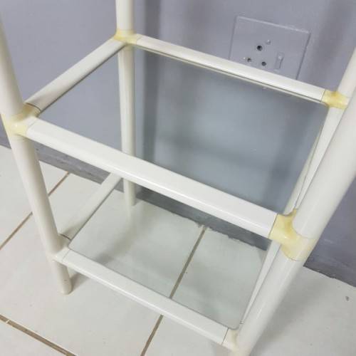A fabulous 4-tier multi-purpose glass shelf display stand in good condition