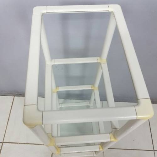 A fabulous 4-tier multi-purpose glass shelf display stand in good condition