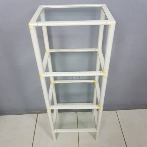 A fabulous 4-tier multi-purpose glass shelf display stand in good condition