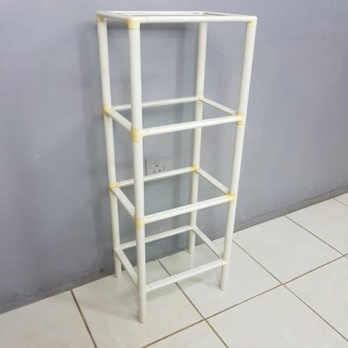 A fabulous 4-tier multi-purpose glass shelf display stand in good condition