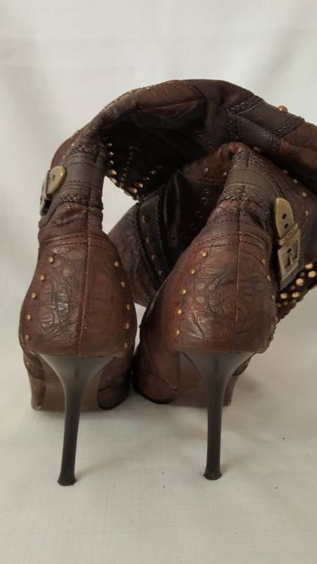 A beautiful and very sexy pair of brown ladies 1to3 mid-calf "studded" stiletto heel zip-up boots