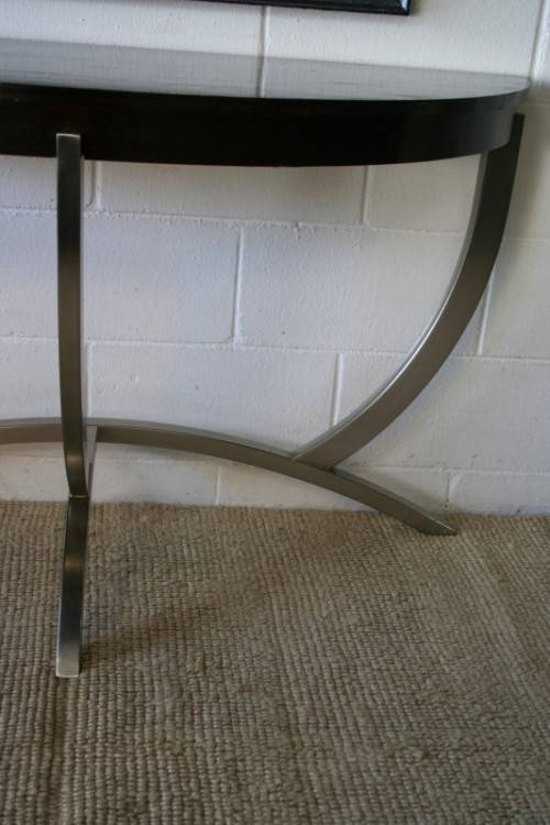 An awesome modern brushed steel framed half-moon console/ occasional table with a dark hardwood top