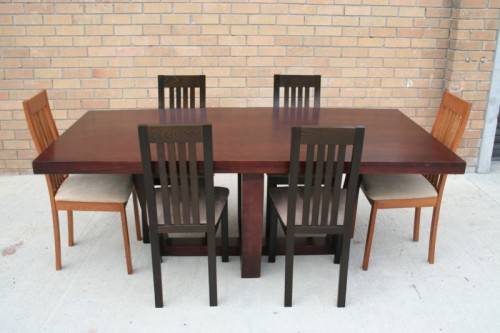 An awesome and stylish modern-styled 6 to 8 seater dining suite in excellent condition