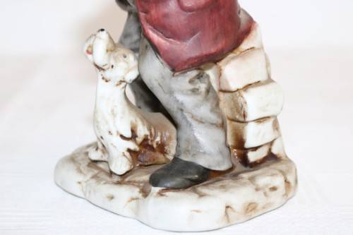 Three wonderful ceramic figurines of men with musical instruments with hand painted detailing