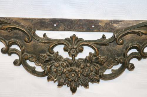 A fabulous antique wall mountable display shelf with amazing ormolu detailing and a glass top