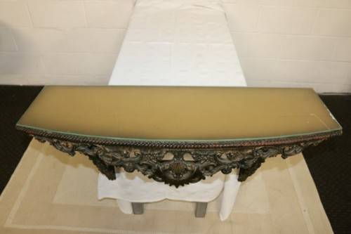 A fabulous antique wall mountable display shelf with amazing ormolu detailing and a glass top