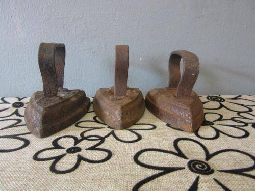 Three fantastic and very collectable vintage/ antique cast iron coal stove clothes iron - price/iron