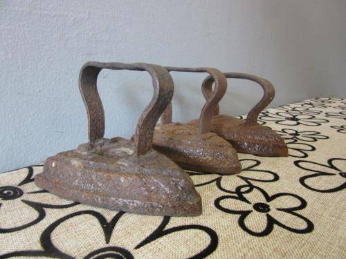 Three fantastic and very collectable vintage/ antique cast iron coal stove clothes iron - price/iron