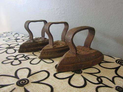 Three fantastic and very collectable vintage/ antique cast iron coal stove clothes iron - price/iron