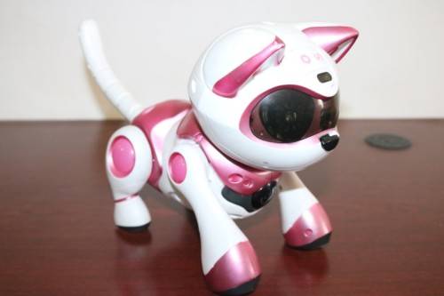 A pink "Tekno Kitty" intelligent robotic toy that interacts with its environment, great gift 4 kids!