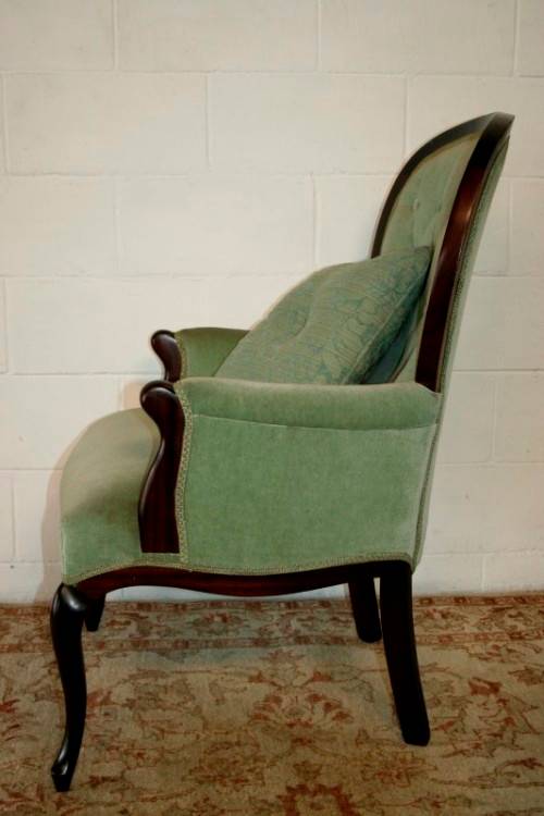 A gorgeous vintage solid Imbuia Queen Anne occasional arm chair in a stylish light green velvet