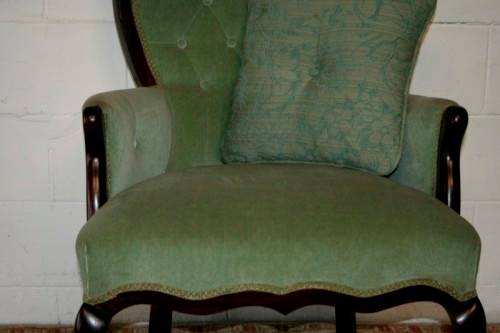 A gorgeous vintage solid Imbuia Queen Anne occasional arm chair in a stylish light green velvet