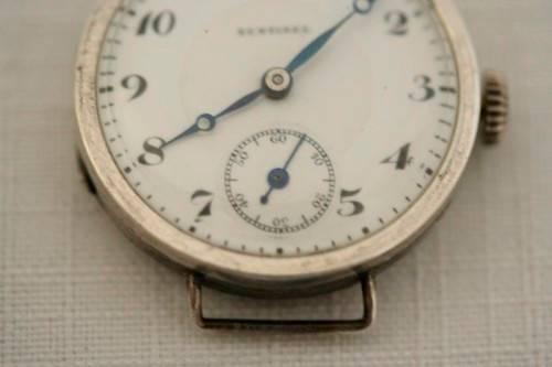 An exquisite antique 13 Jewell Swiss made "Sentinel" gents sterling silver trench watch = Beautiful!