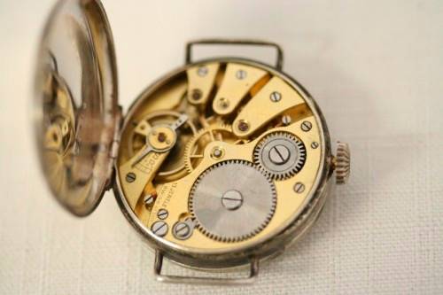 An exquisite antique 13 Jewell Swiss made "Sentinel" gents sterling silver trench watch = Beautiful!