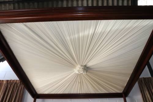 A luxurious solid Teak four-poster KING SIZE canopy bed w/ mattress in amazing condition!!RS17Bed