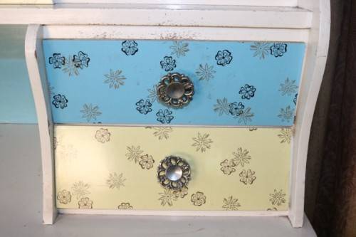 A fantastic Art Deco Hoosier kitchen cabinet w/ loads of cupboard space & a built in clock