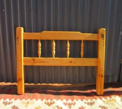 **RS17** Two natural pine spindle "single bed" size headboards in good condition. Bid/headboard