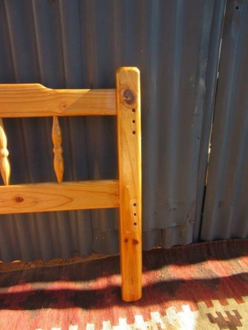 **RS17** Two natural pine spindle "single bed" size headboards in good condition. Bid/headboard