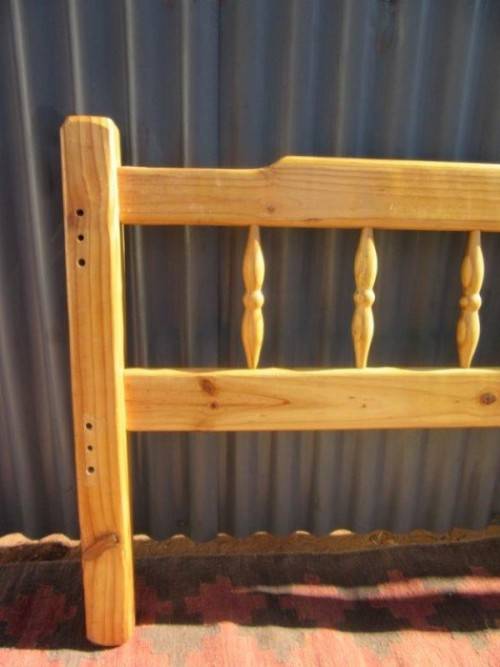 **RS17** Two natural pine spindle "single bed" size headboards in good condition. Bid/headboard