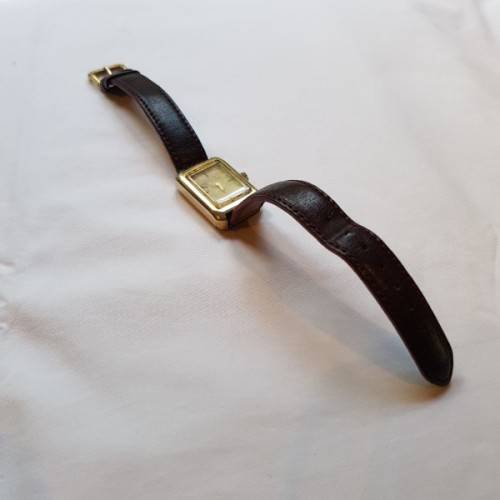 An awesome vintage "Bulova Accutron" ladies gold plated wrist watch with a leather strap