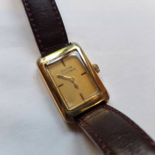 An awesome vintage "Bulova Accutron" ladies gold plated wrist watch with a leather strap
